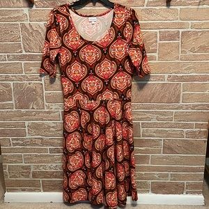 Lularoe Nicole with bright colorful Moroccan pattern size large.